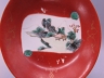 酱地描金开光书卷山水纹盘