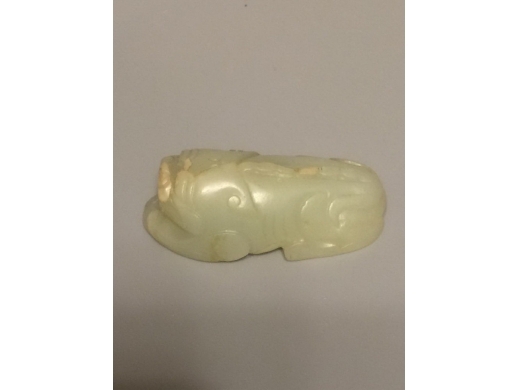 白玉琢端狩把件
