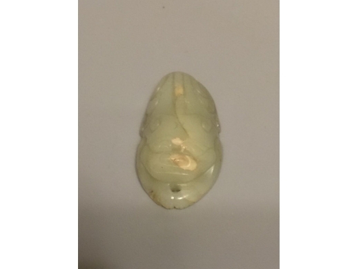 白玉琢端狩把件