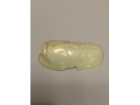 白玉琢端狩把件
