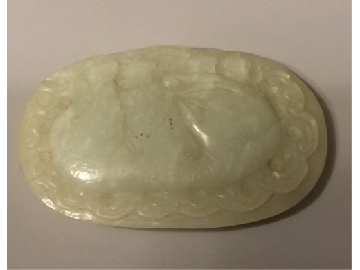 白玉琢太平象大腰园帶扣