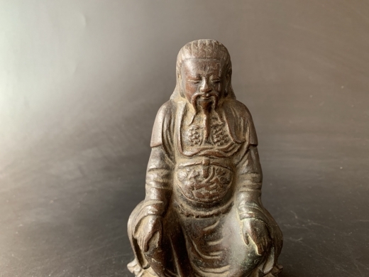 紫铜坐像