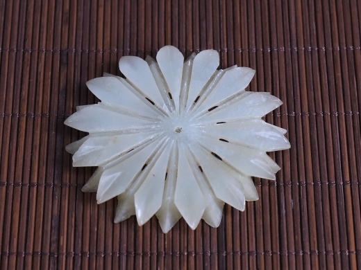 玉花形佩