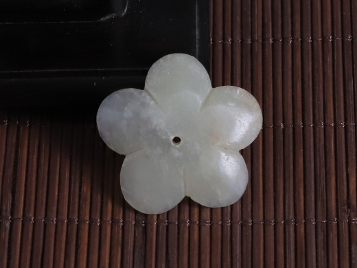 玉花形佩