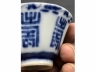 青花蝠寿纹八角茶盅