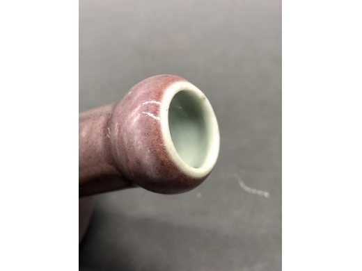 祭红釉蒜头扁天球瓶