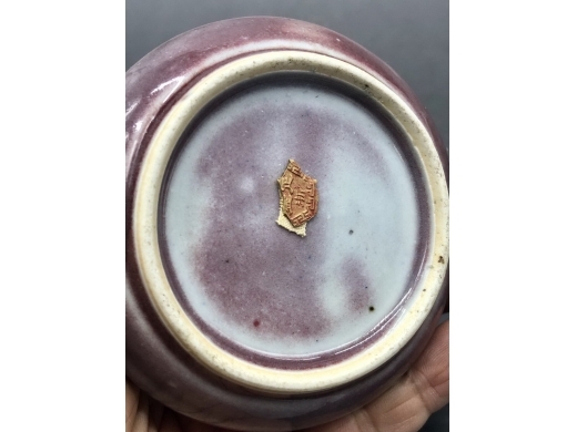 祭红釉蒜头扁天球瓶