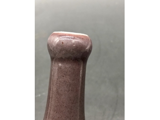 祭红釉蒜头扁天球瓶