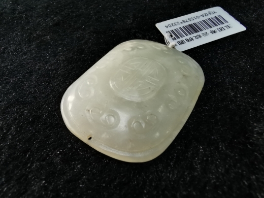 白玉团寿云纹帽正