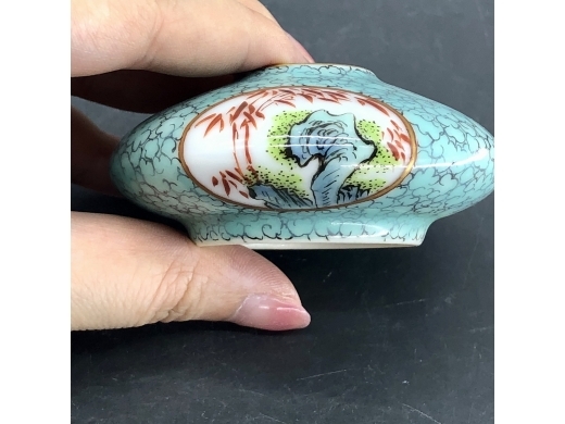 粉彩松石绿底开光洞石纹水盂