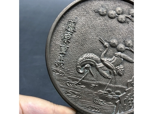 白铜松鹤纹带柄铜镜