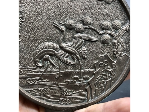 白铜松鹤纹带柄铜镜