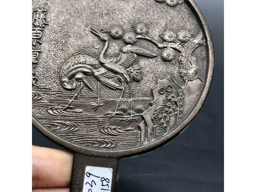 白铜松鹤纹带柄铜镜