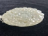 白玉梅花纹佩