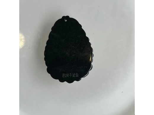15墨翠金镶玉佛